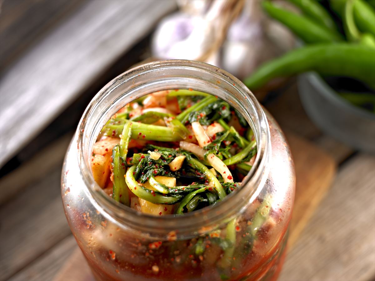 Kimchi made of Young Radish in Glass Bootle.